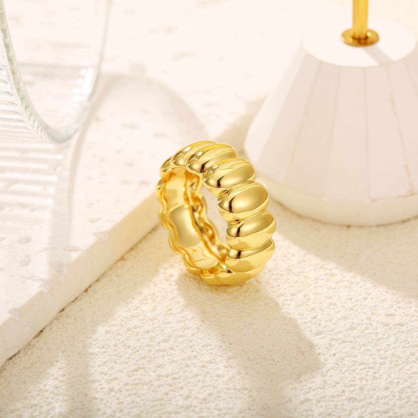 Statement gold vermeil ring with a bold, ribbed design and polished finish