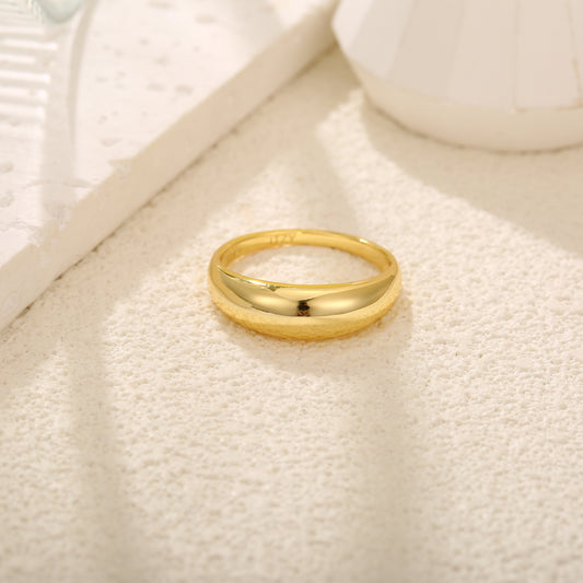 Elegant gold vermeil ring with a sleek, polished dome design, available in 14K gold and silver