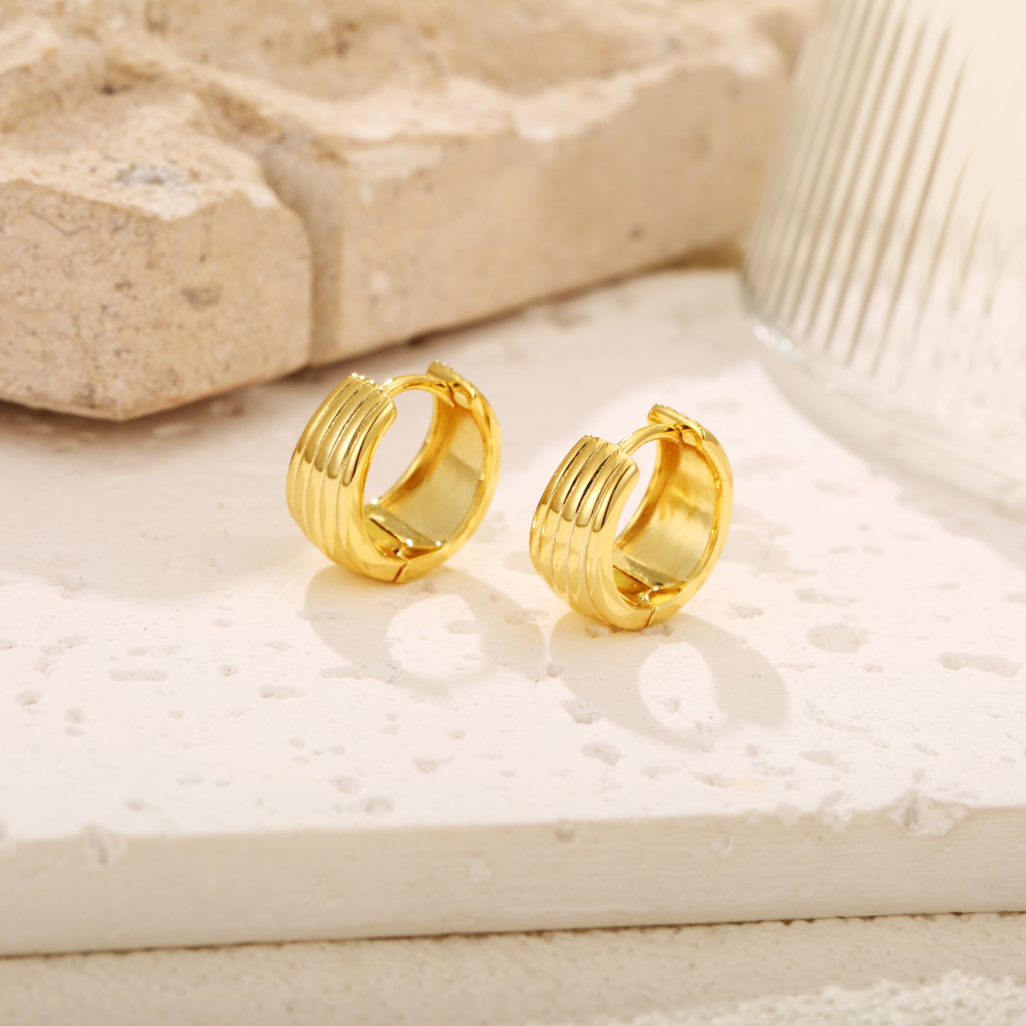 Elegant gold vermeil hoop earrings with a ribbed, layered design