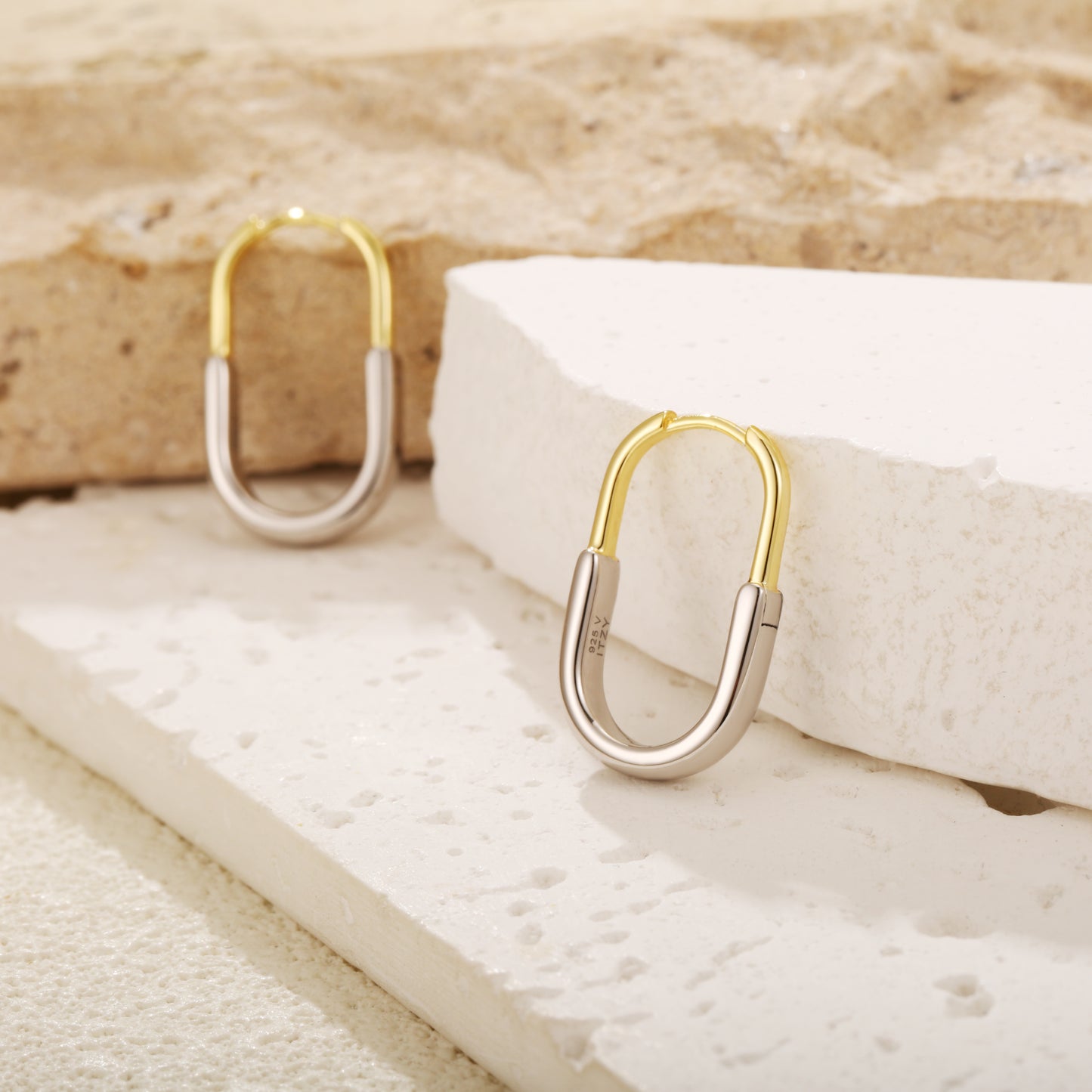 Two-tone gold vermeil hoop earrings with a sleek, modern design